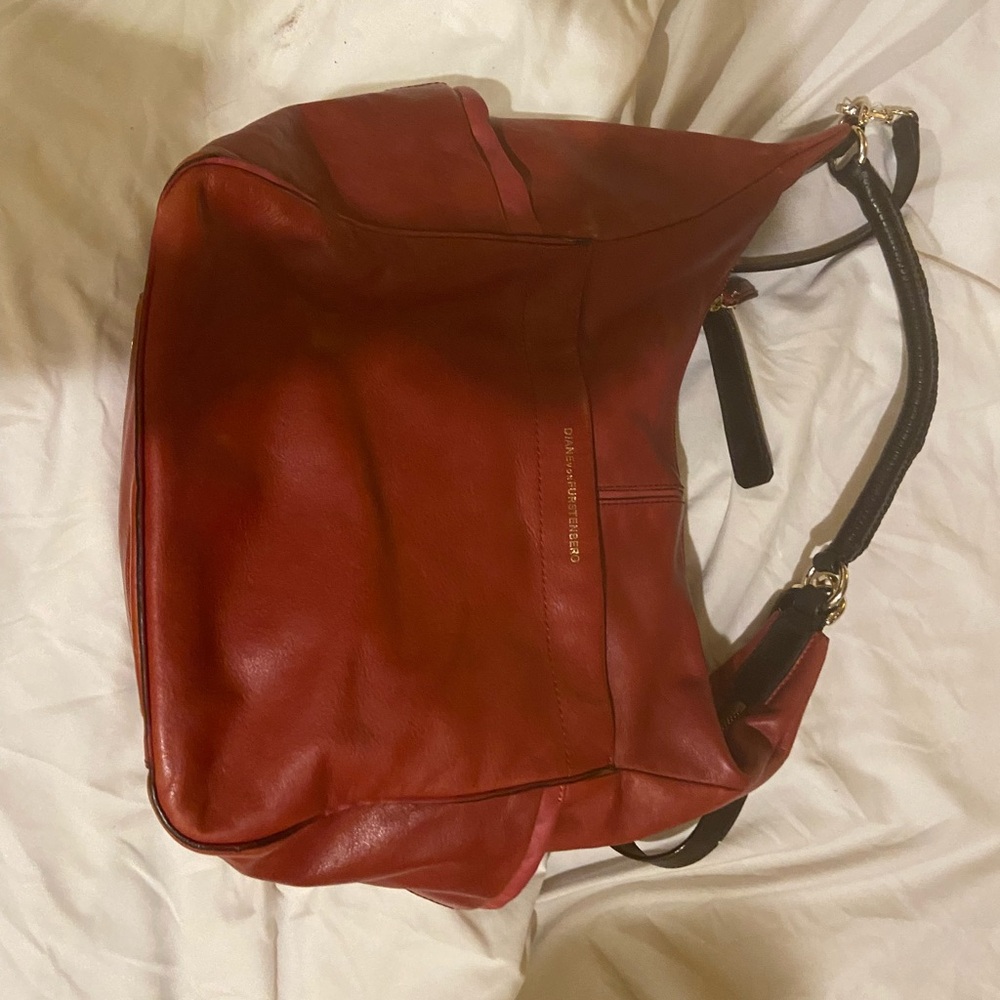 Diane Von Furstenberg Burgundy and black beautiful slouch bag.